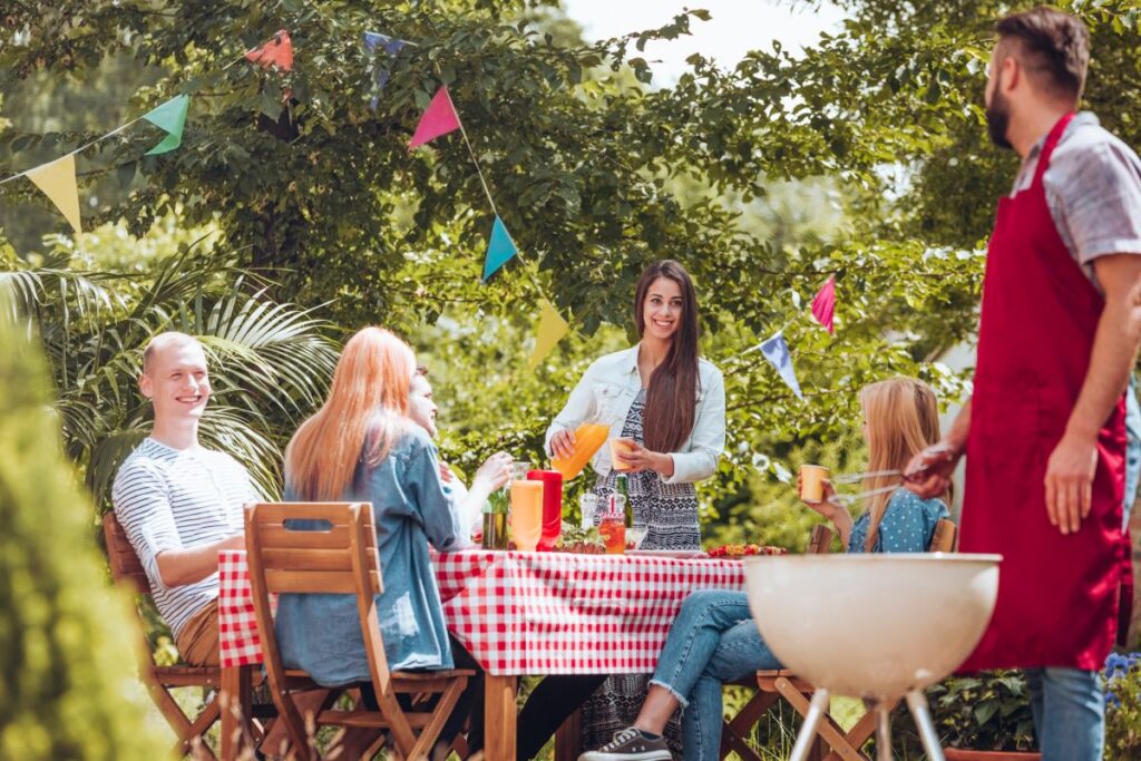 Backyard event setup in Richmond Hill with LED tables and canopies
